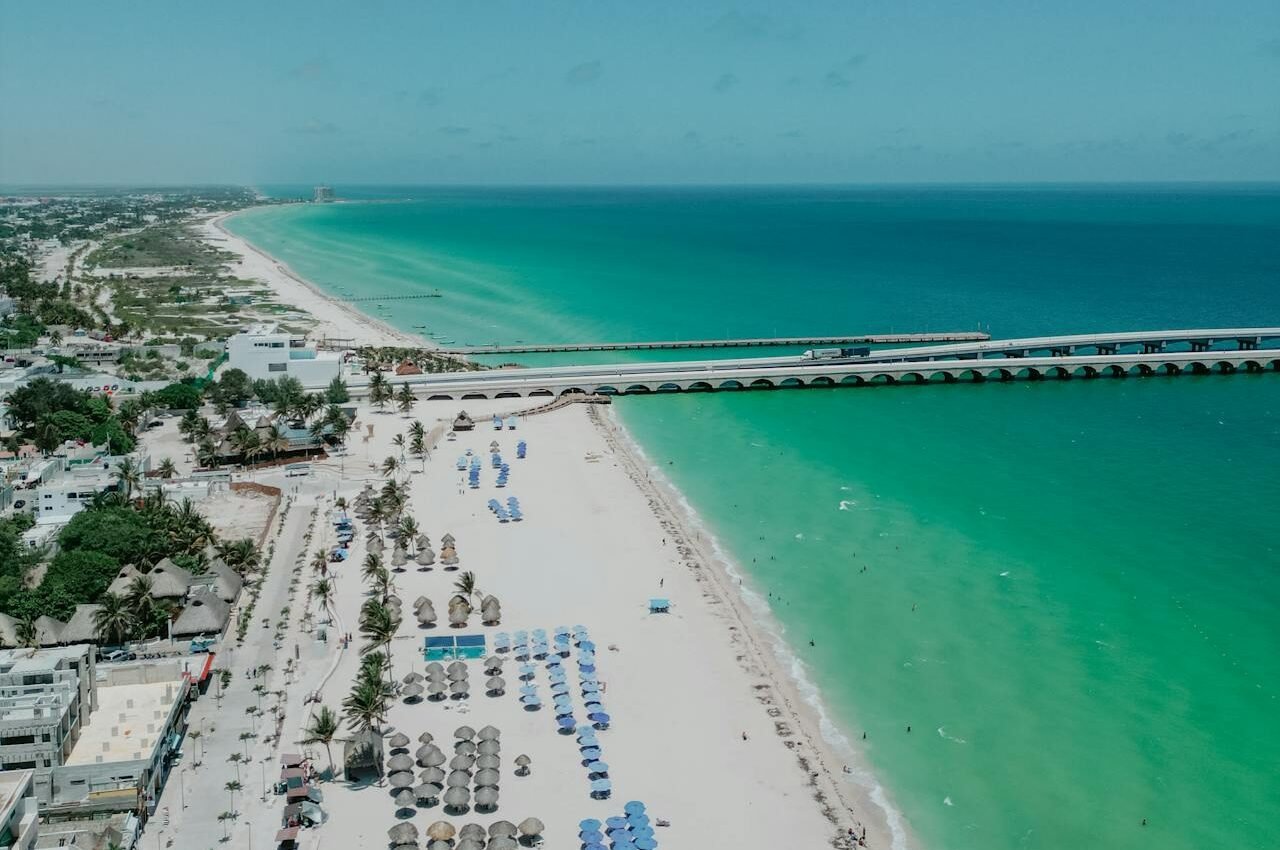 Comparison of Sisal and Progreso beach towns along the Yucatan coast